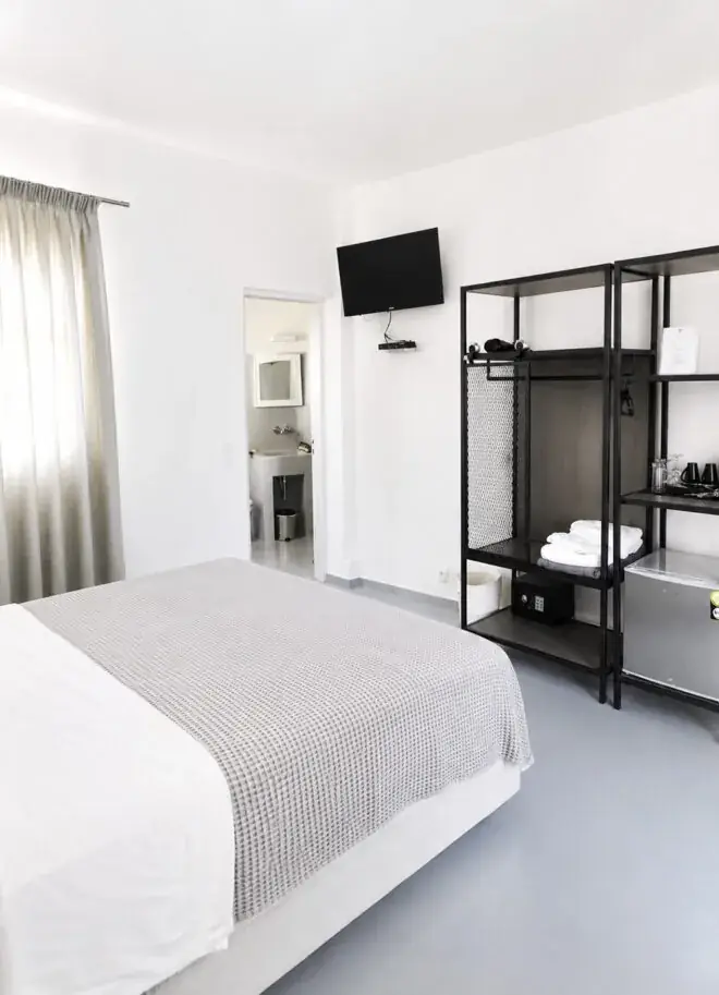 Deluxe suite bedroom at Artemis Suites