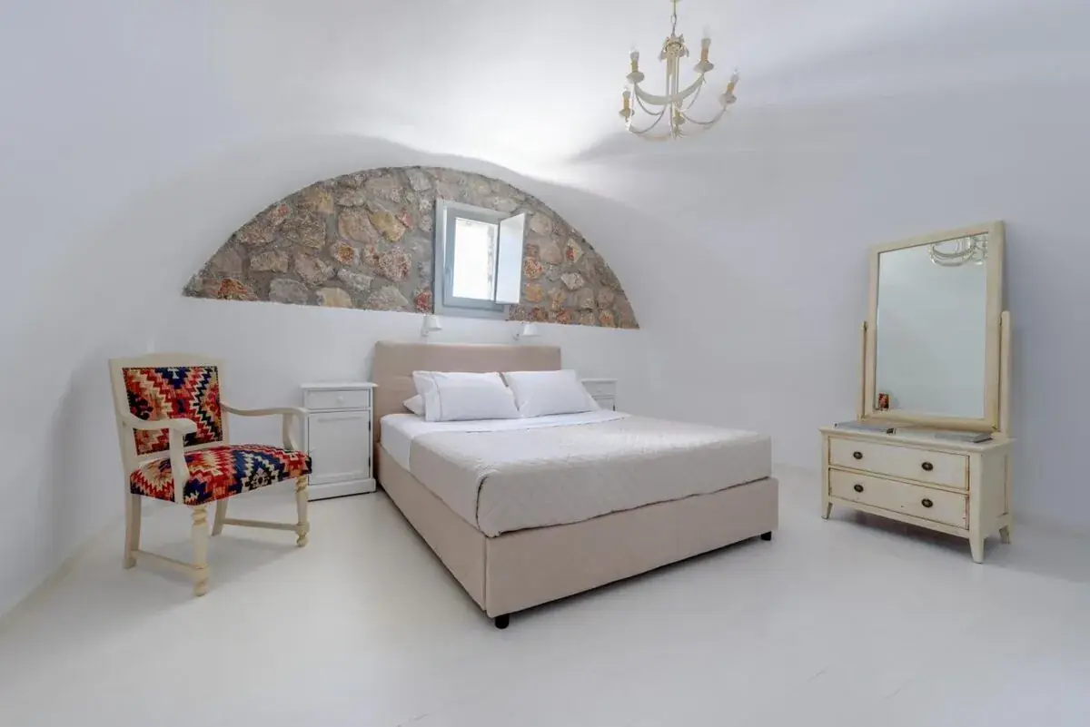 Bedroom in a cave-style suite at Black Gem Villa