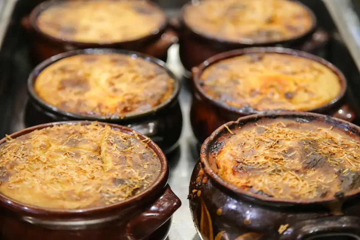 Traditional Greek dishes baked in clay pots at Fish Tavern O Perivolos